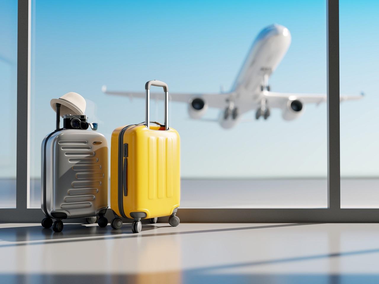 Photographs of suitcases in the airport lobby.