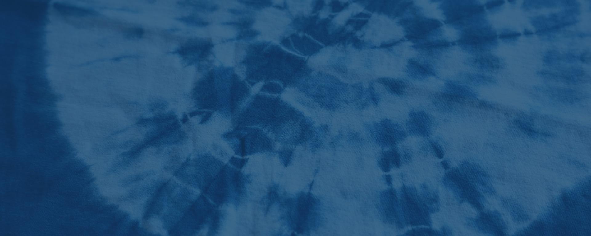 Photograph of dyed goods with an indigo image.