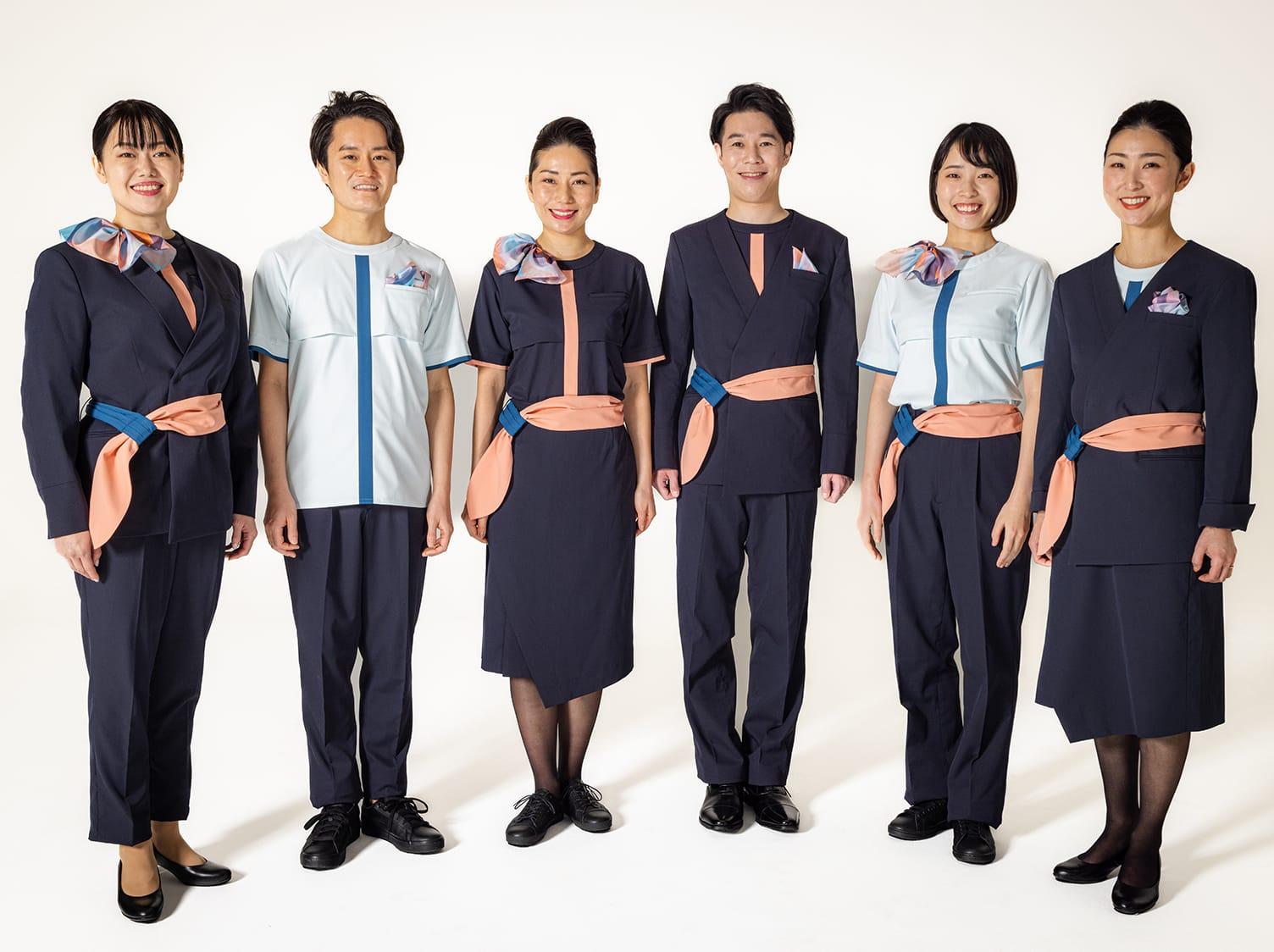 Group photograph of six cabin attendants wearing the new AirJapan uniform