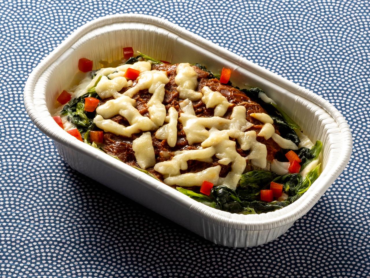 Photograph of in-flight meal Hamburger steak with rice gratin