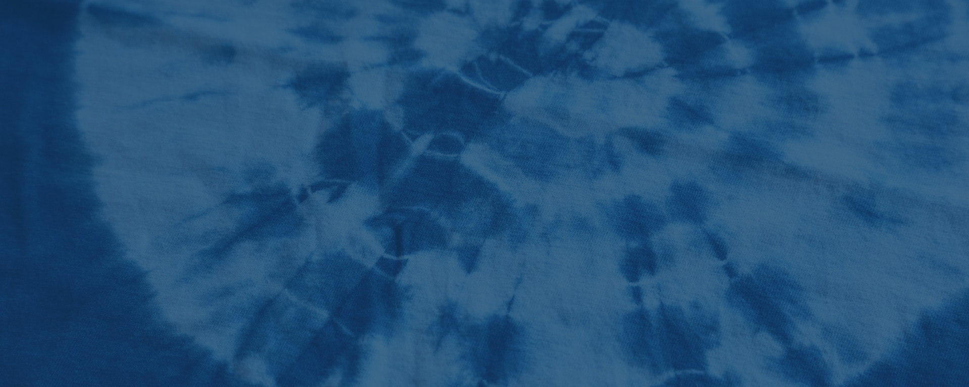 Photograph of dyed goods with an indigo image.
